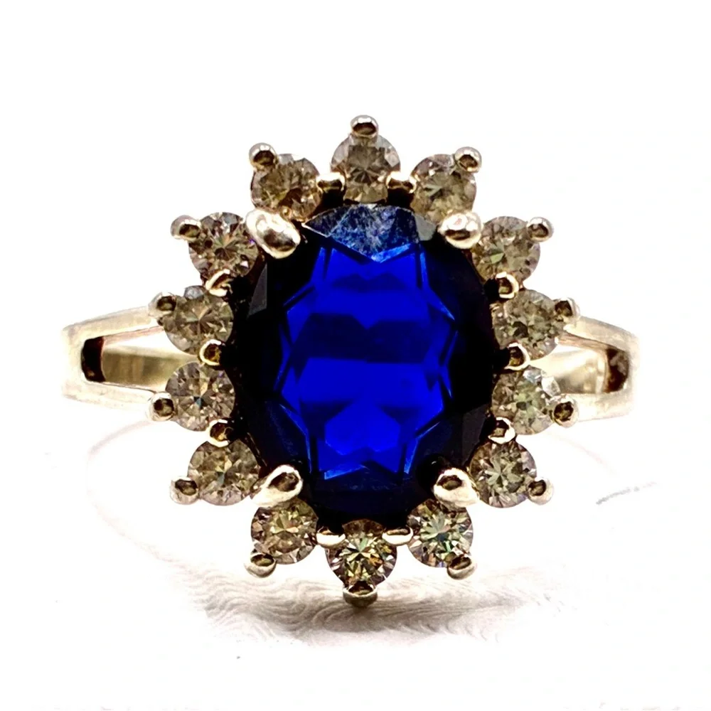 VTG Signed JC Oval Cut Cubic Zirconia Sapphire with Halo of CZ’s In Silver Tone